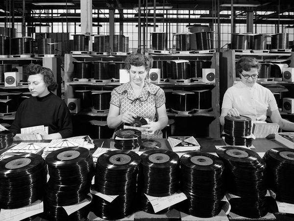 3 women creating vinyl disks