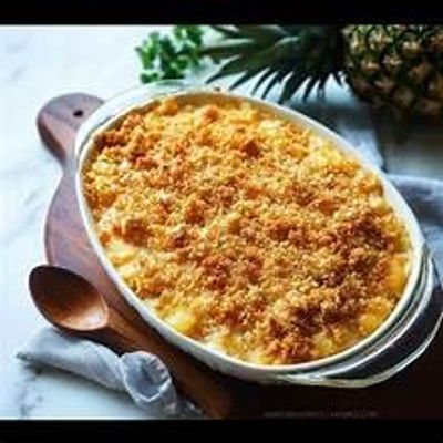 Baked macaroni and cheese with golden breadcrumb topping.