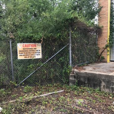 Institutional Control signage at former corrugated plant. 