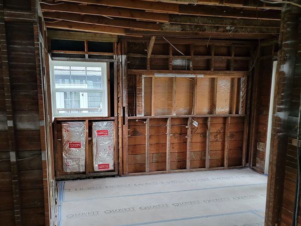 Old 1920s era remodel existing home in Portland with board sheathing and lath and plaster walls