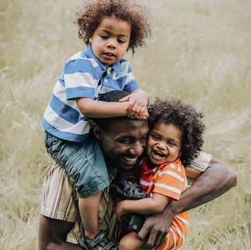 Man with two small sons.