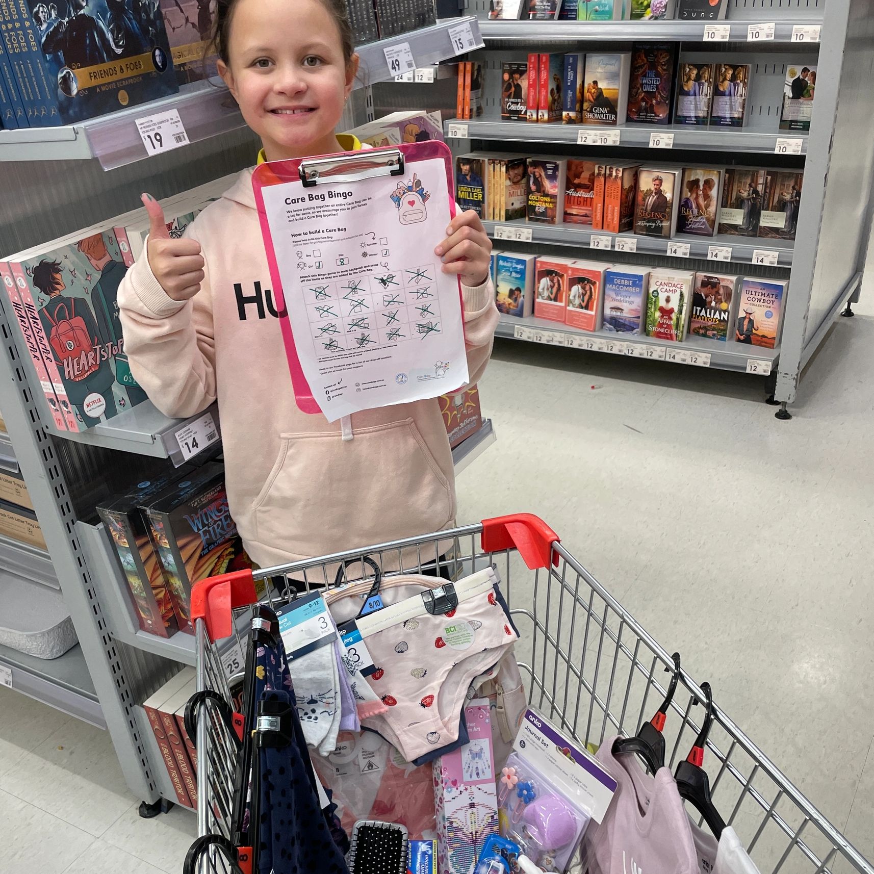 Child playing Care Bags Bingo to build a Care Bag.