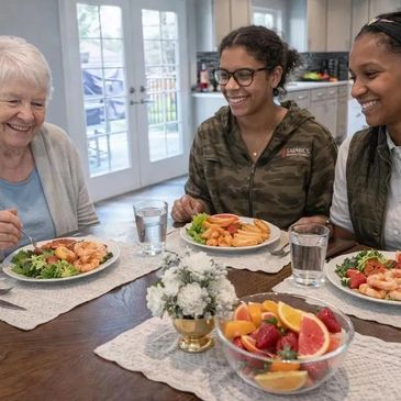 Three women enjoying a meal together at a dining table.