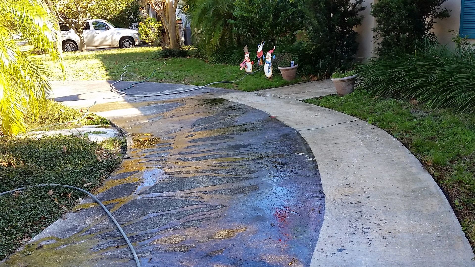 Driceway being pressure washed