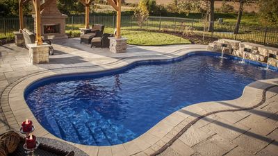 pool installed by armstrong pools & outdoors - coral sea with water feature