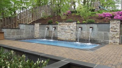 pool installed by armstrong pools & outdoors - grande with water feature