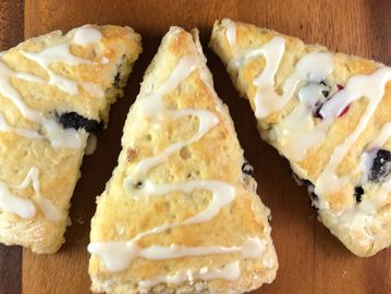 Blueberry scones are a classy favorite.  Add a lemon drizzle for incredible complementary flavor