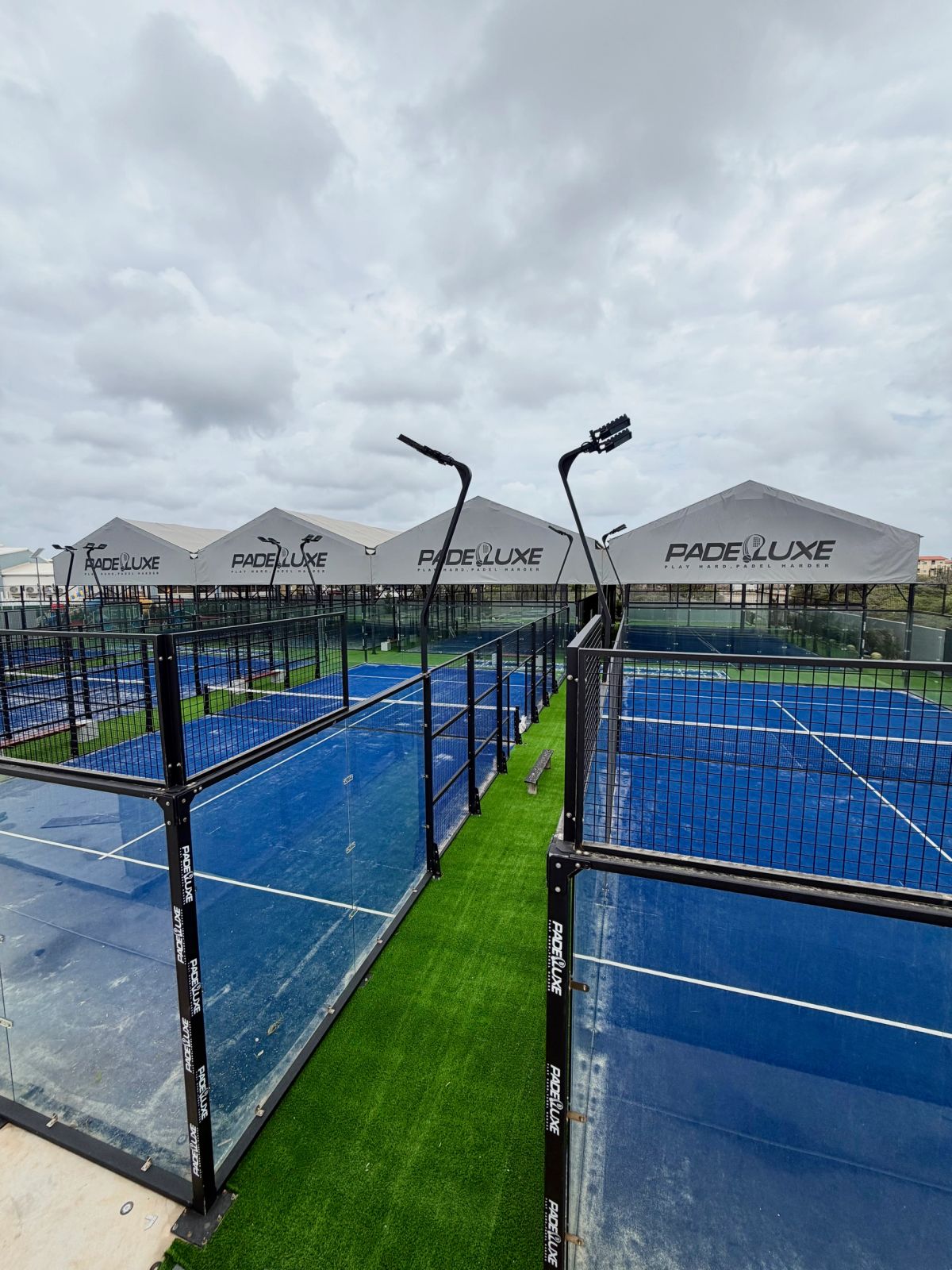 Players during a padel match at Padeluxe Aruba