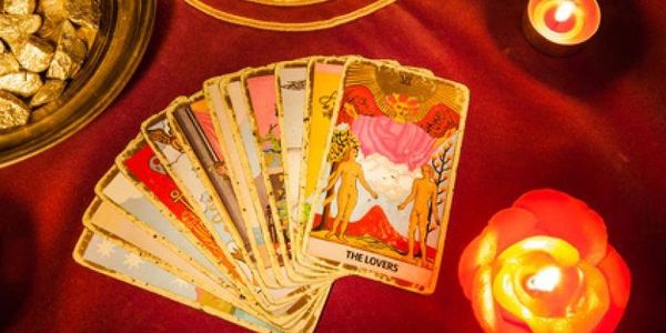 a bunch of tarot cards placed on the table