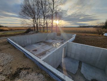 A site with construction work in an open field