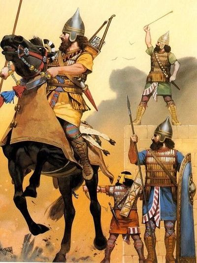 Ancient warriors in armor, one mounted on a horse, ready for battle.