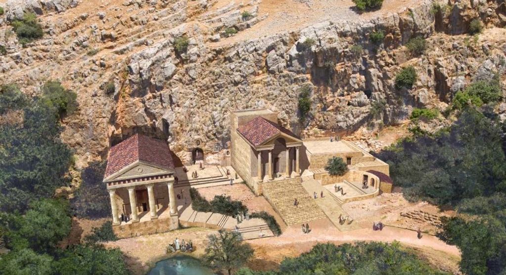 Ancient temple complex nestled against rocky cliffs with surrounding greenery and a small pond.