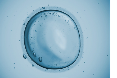 Close-up view of a single bubble in water.