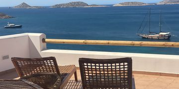 Outdoor sun beds offering panoramic views over the Aegean 