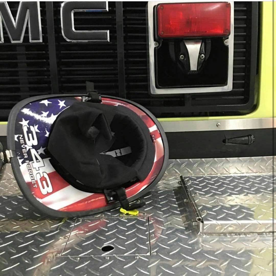 A fireman's helmet with a US flag design