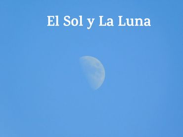 The moon in a blue sky with the text 'El Sol y La Luna'.