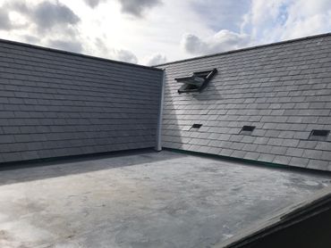 alt="vickers_roofing_hampshire_slate_natural_roofing_flat_roof_epdm"