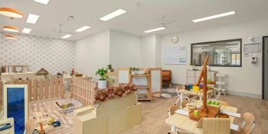 A well-organized early childhood classroom with toys and furniture.
