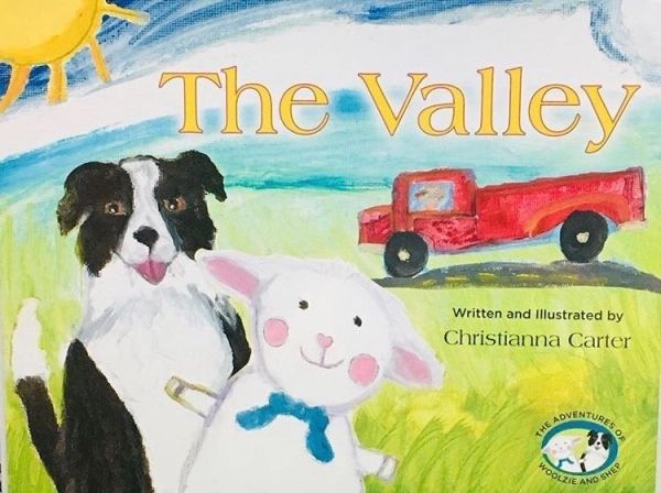 Cover of a children's book featuring a dog, sheep, and red truck under the sun.