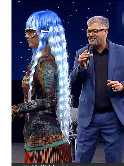 Stormie Andrews and Desdemona the Robot on stage at Interstellar Soiree during CES 2024