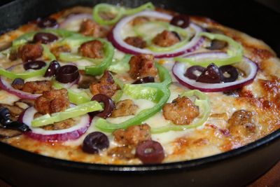 Sour dough, Gluten-free Pan Pizza w/Sausage, Kalamata Olives, Purple Onion, Green Bell Pepper 
