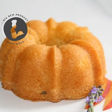 Award-winning Peach-Lavender Bundtlet on marble slab