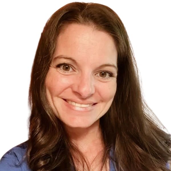 Smiling woman with long brown hair against white background.
