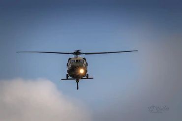 A Colombian police Sikorsky UH-60 Black Hawk helicopter flying towards TJ during a training flight