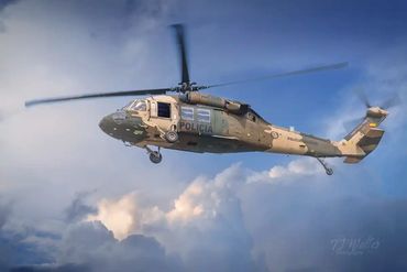 A Colombian police Sikorsky UH-60 Black Hawk helicopter flying towards TJ during a training flight