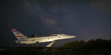 RA-5C Vigilante bomber in the foreground with the Milky Way Galactic Core in the sky.