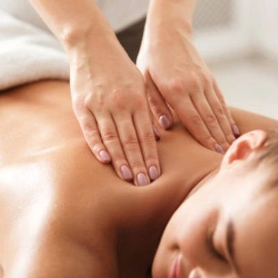 Person receiving a back massage.