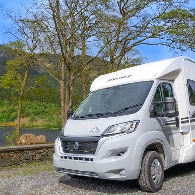 Hire Motorhome parked up in front of mountains