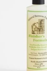 Bottle of Finisher's Formula Natural Beeswax Polish for wood care.