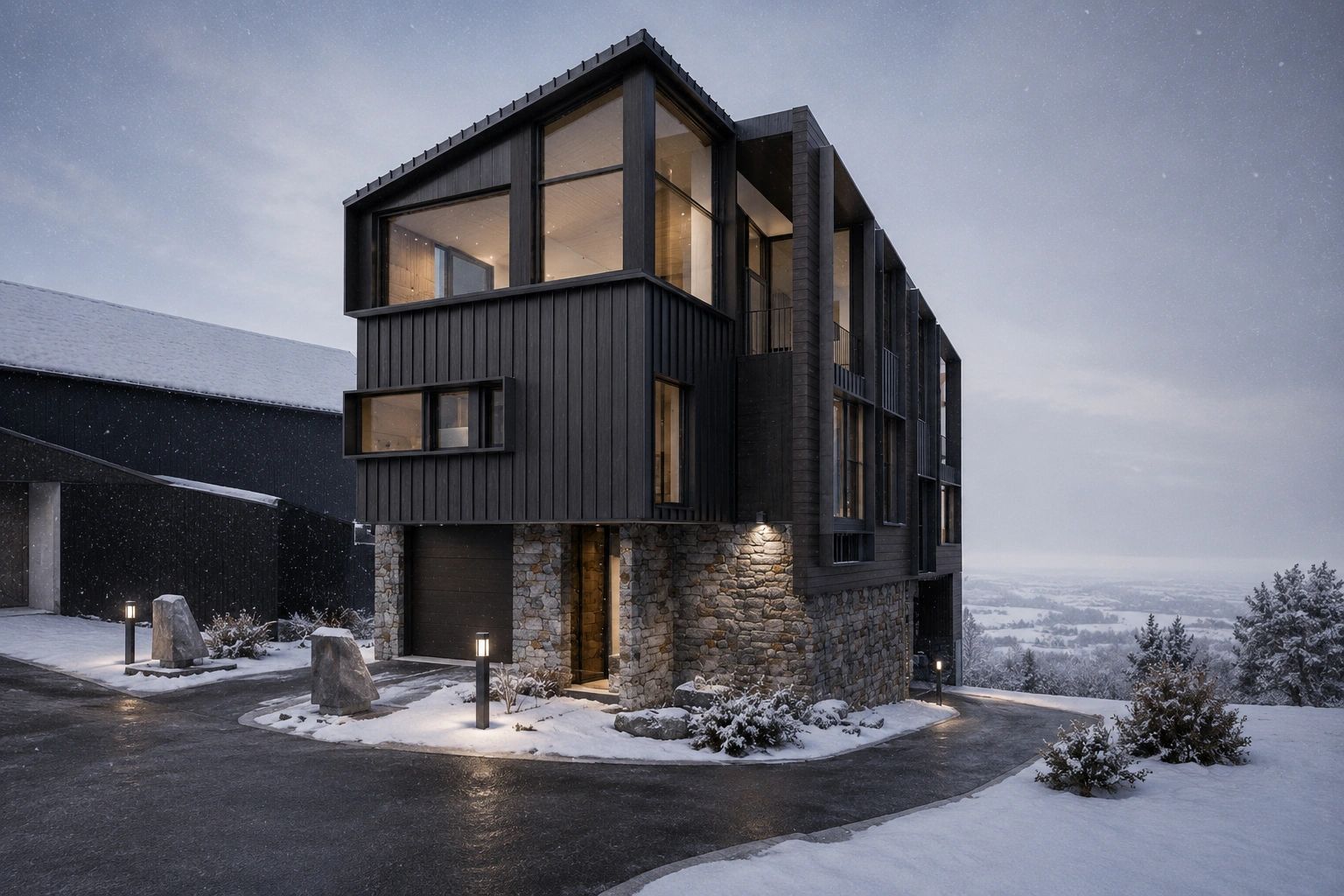 Modern house with stone and dark wood exterior in snowy landscape.