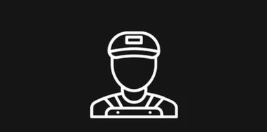 Simple white icon of a worker wearing a cap and overalls on black background.