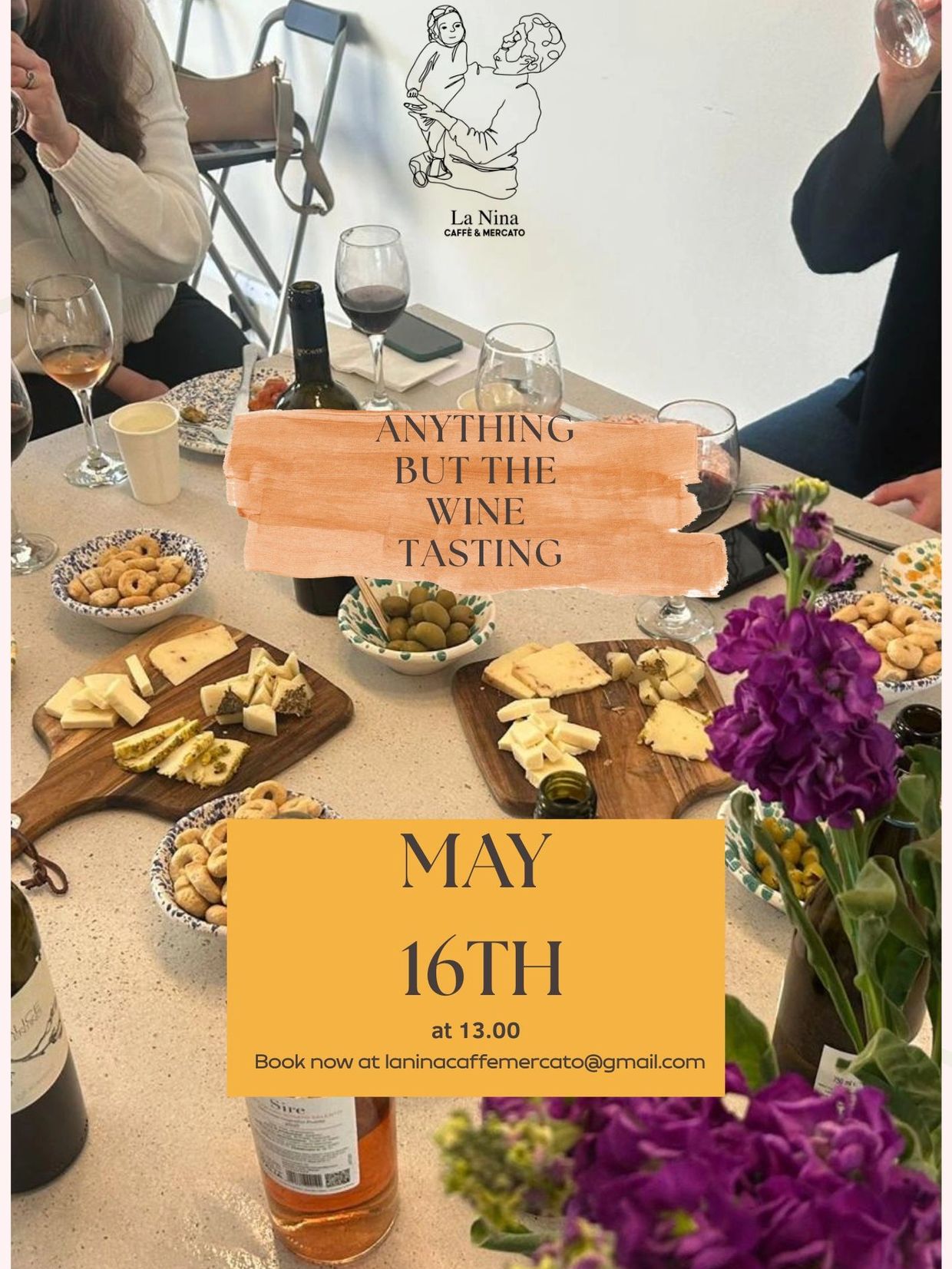 Wine tasting event with cheese and snacks at La Nina Caffè & Mercato.