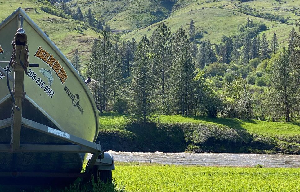 Anglers Edge Adventures drift boat on the shores of the South Fork of the Clearwater River. 