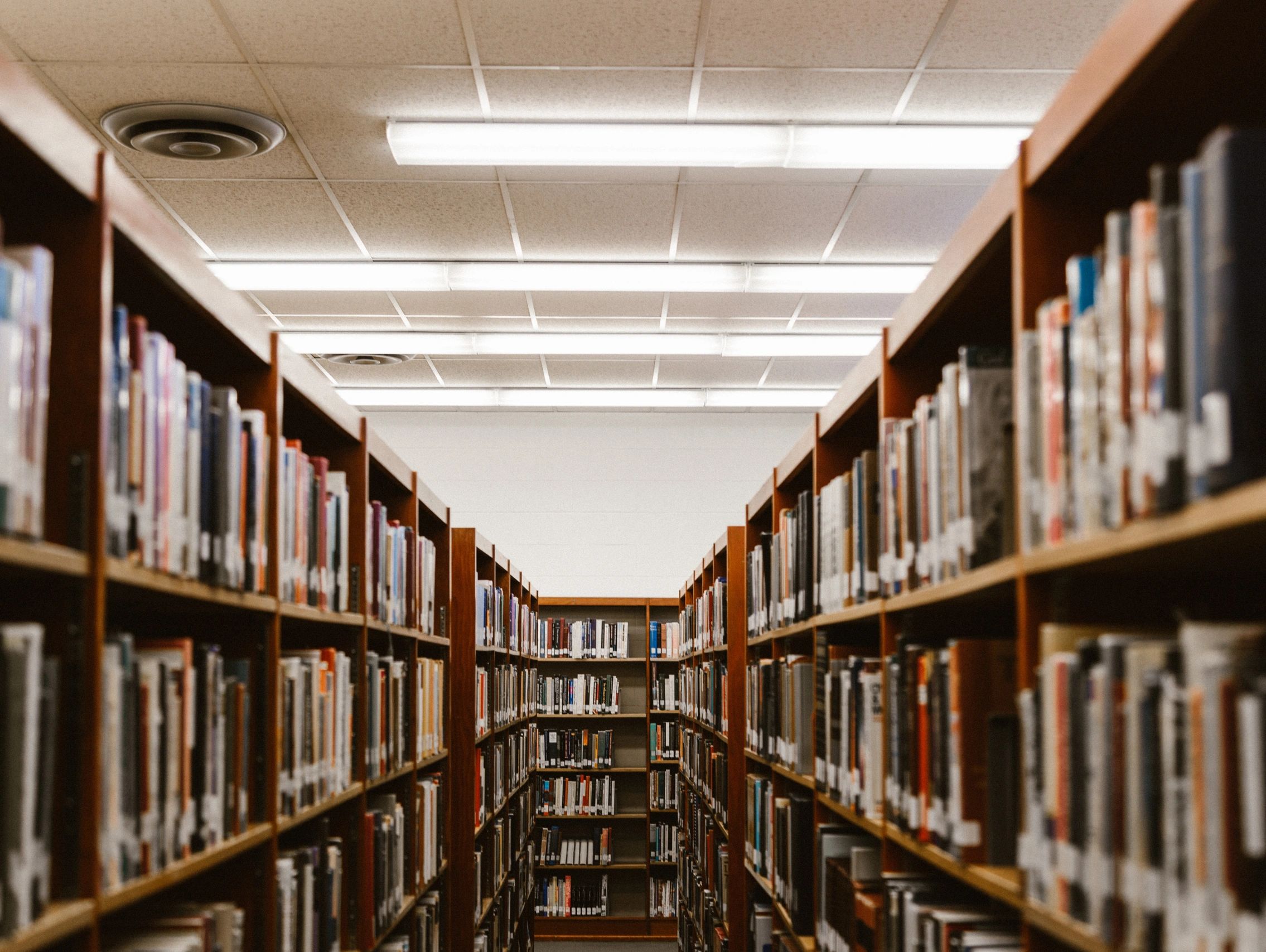 Stacks of books in a library.