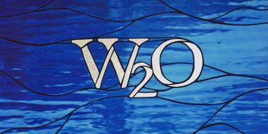 Ocean inspired stained glass window Watermark restaurant Ventura