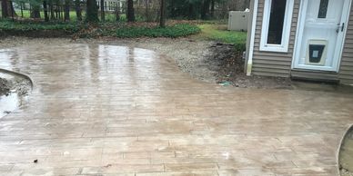 Stamped concrete patio construction in chesterland