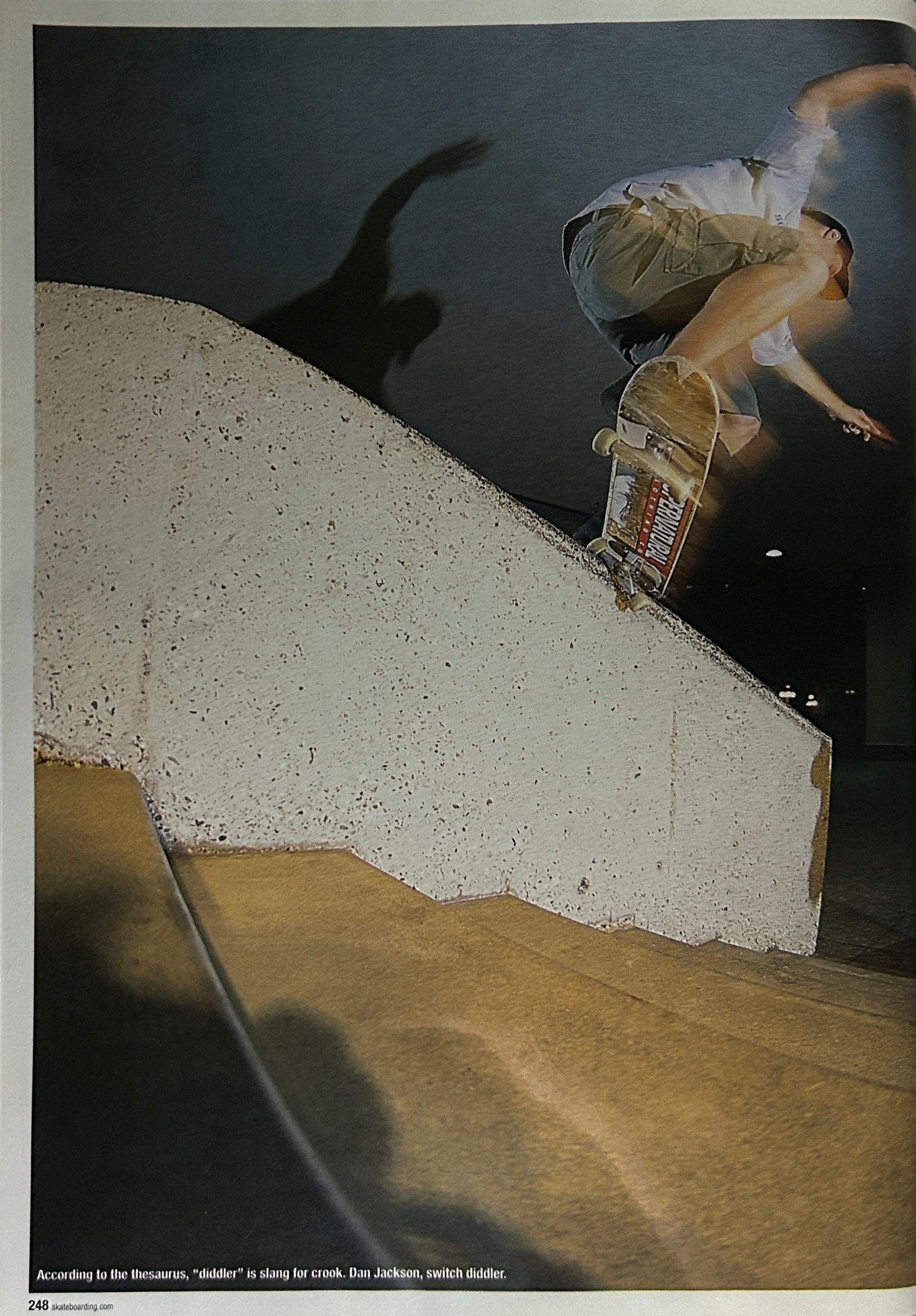 Skateboarder Dan Jackson performing a switch diddler trick on stairs.