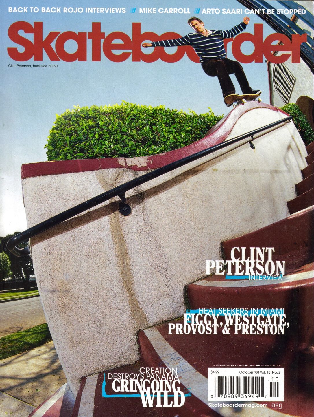 Skateboarder performing a backside 50-50 grind on a curved ledge rail.