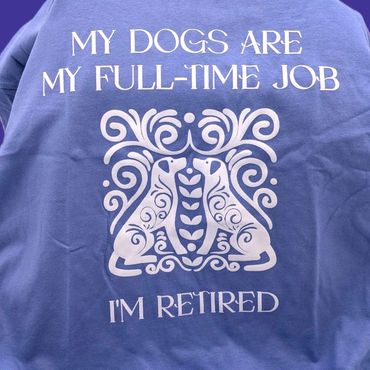 Blue shirt with dogs and retirement message.
