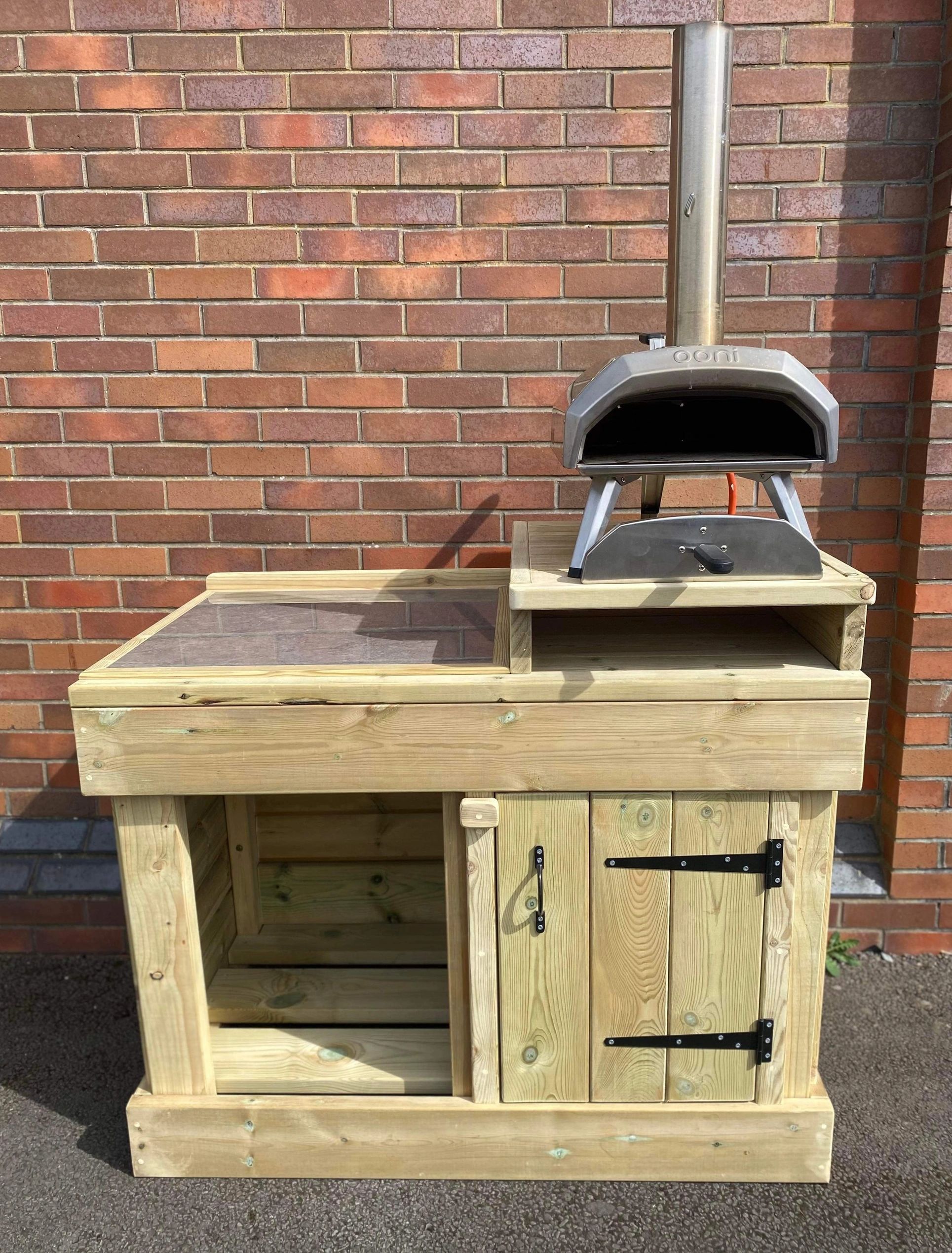 Pizza preparation station. Pizza station for pizza oven and gas bottle. With tiled slab.