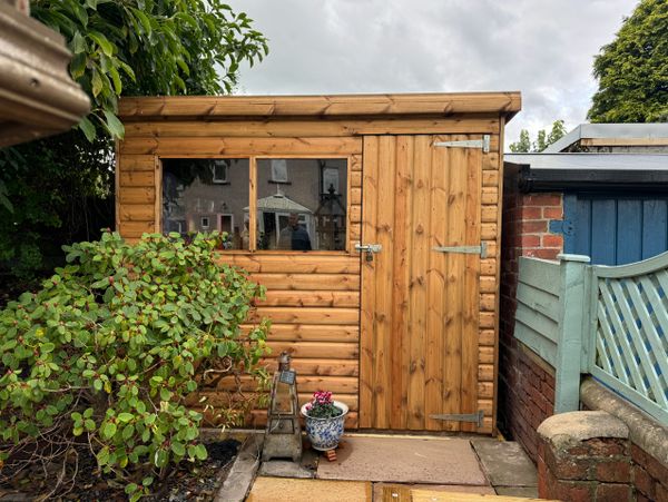WUBI Cabins and Leisure 8' x 6' Pent shed with single door and double window
