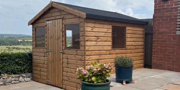 WUBI Cabins and Leisure Apex shed with single door and 3 windows