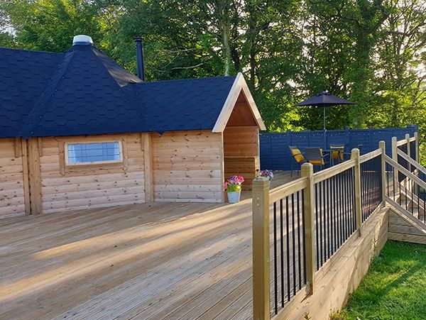 WUBI Cabins and Leisure Camping and Glamping Cabin with a 3m Extension, porch and decked sun terrace