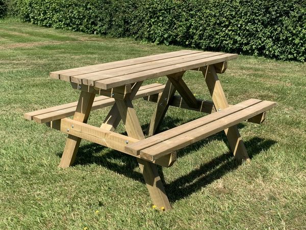 Standard adults timber picnic table with bench seats. Wooden picnic table.