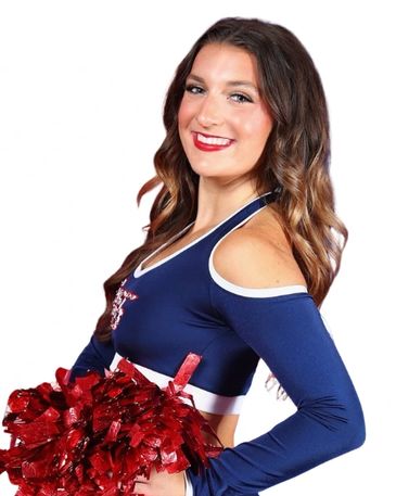 Cheerleader with red pom-poms smiling at the camera.