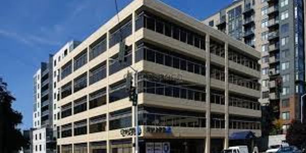 Modern office building on a street corner.